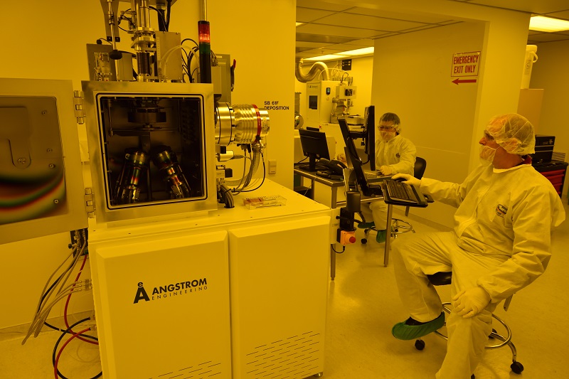 working on equipment in lab