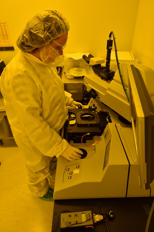 working on machine in lab