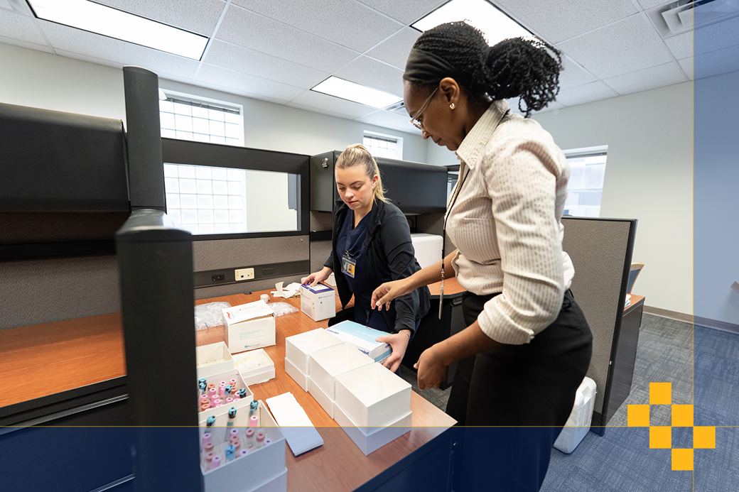 Coordinators preparing blood tube kits